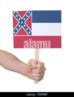 Hand, die kleine Karte, isoliert auf weiss - Flagge von Mississippi Stockfoto