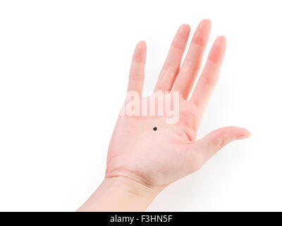 Frau Hand mit schwarzen Punkt isoliert auf weiss mit Beschneidungspfad Stockfoto