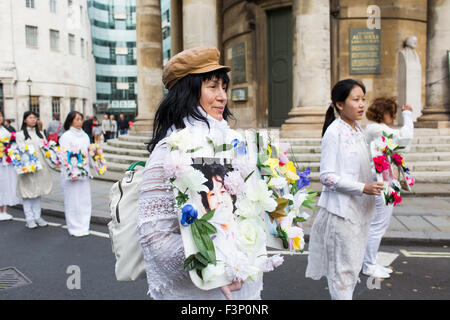 FA-Lun-Gong-Praktizierenden während einer Demonstration, London, Großbritannien Stockfoto