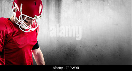 Zusammengesetztes Bild Nahaufnahme des american Footballspieler mit Schwerpunkt Stockfoto