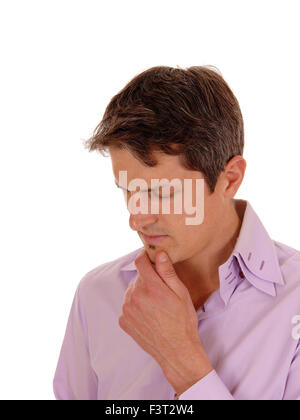 Eine Nahaufnahme Bild des Denkens Geschäftsmann mit einer Hand am Kinn, für weißen Hintergrund isoliert. Stockfoto
