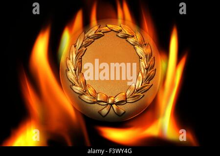 Trophäe, umgeben von Flammen Stockfoto