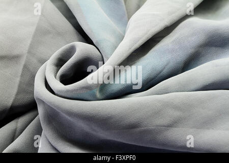 Grauer Hintergrund Textil (Nahaufnahme) Stockfoto