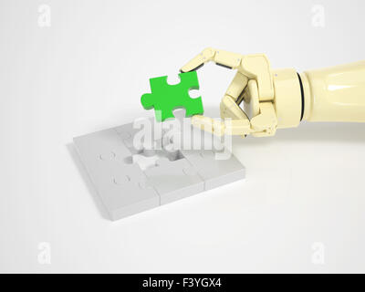 Roboter vervollständigt Puzzle-Spiel Stockfoto