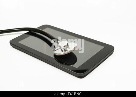 Medizinische Stethoskop gesetzt über das Display eines Tablet-PC, Konzeptbild über Informations-und Telekommunikationstechnologie Stockfoto Medizinische Stethoskop gesetzt über das Display eines Tablet-PC, Konzeptbild über Informations-und Telekommunikationstechnologie Stockfoto