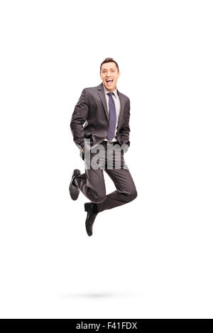 In voller Länge Portrait von freudigen Geschäftsmann erschossen in der Luft beim springen aus Glück isoliert auf weißem Hintergrund Stockfoto