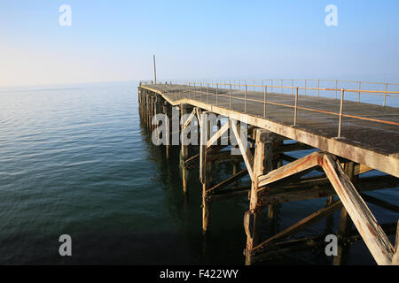 Alte Mole, wo Granit exportiert wurde, Trefor, Llyn Peninsular, Gwynedd, Nordwales, UK Stockfoto