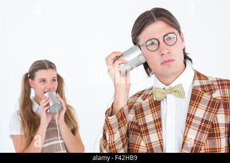 Geeky Hipster mit Schnur-Telefon Stockfoto