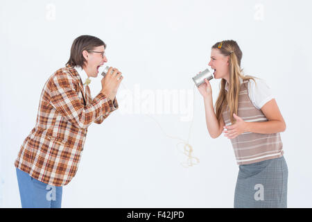 Geeky Hipster mit Schnur-Telefon Stockfoto