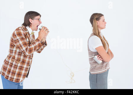 Geeky Hipster mit Schnur-Telefon Stockfoto