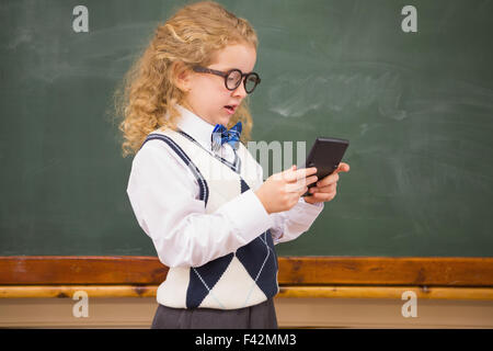 Schüler mit Taschenrechner Stockfoto