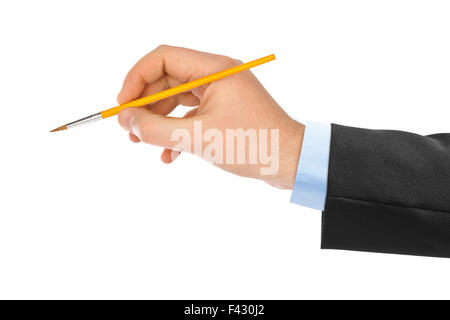 Hand mit Pinsel Stockfoto