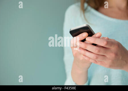 Instant messaging mit smartphone Stockfoto