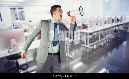 Zusammengesetztes Bild der Geschäftsmann mit Megaphon Stockfoto