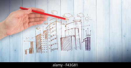 Zusammengesetztes Bild von Hand mit rotem Stift Stockfoto