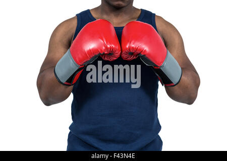 Fit Mann Boxen mit Handschuhen Stockfoto