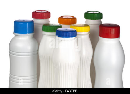 Milchprodukte-Flaschen mit hellen Abdeckungen Stockfoto