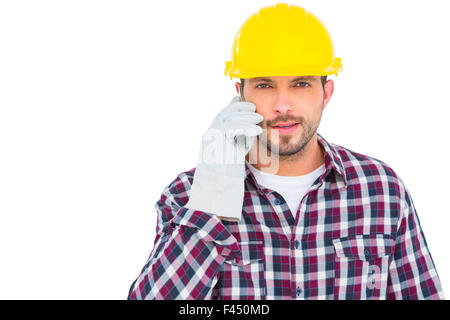 Mechaniker telefonieren mit Handy Stockfoto