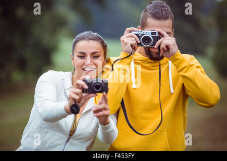Glückliches Paar fotografieren, Kamera Stockfoto