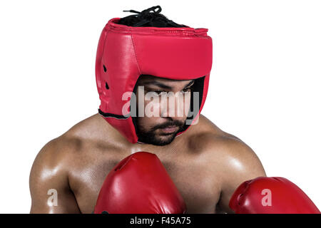 Muskulöser Mann Boxen in Handschuhe Stockfoto