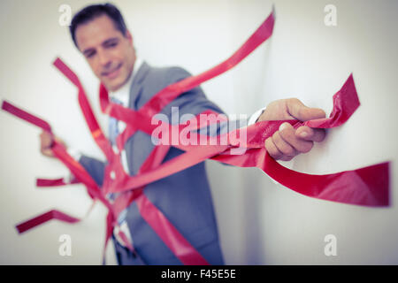 Geschäftsmann von Bürokratie gefangen Stockfoto