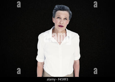 Zusammengesetztes Bild des schweren Geschäftsfrau Stockfoto