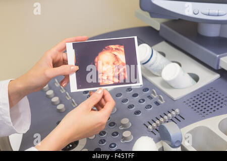 Arzt zeigt Bild Stockfoto