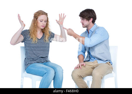 Paare, die ein Argument zu sitzen Stockfoto