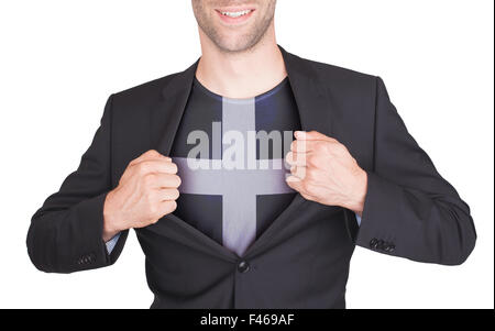 Geschäftsmann Eröffnung Anzug, Hemd mit Fahne, Cornwall zu offenbaren Stockfoto