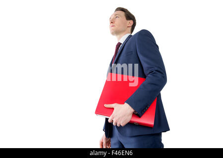 Nachdenklich Geschäftsmann Betrieb rote Ordner Stockfoto