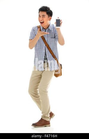 Junger Mann mit Handy Stockfoto