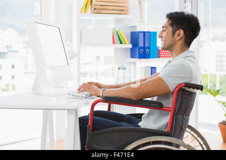 Jungunternehmer im Rollstuhl Stockfoto