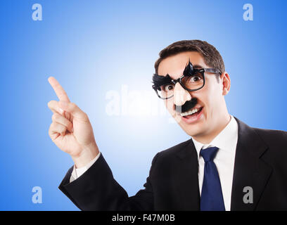 Lustige Geschäftsmann mit Augenbrauen und Schnurrbart Stockfoto