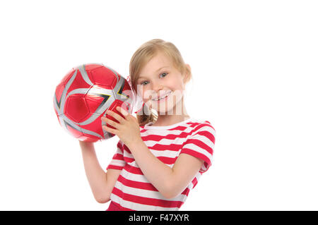 glückliches Mädchen mit Fußball Stockfoto