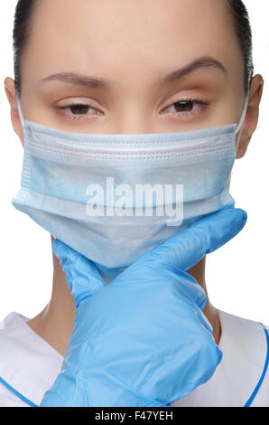 Junger Arzt in einer Maske Stockfoto