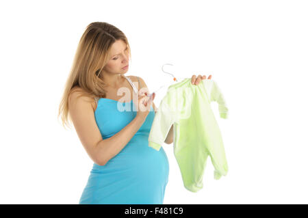 Schwangere, Baby-Kleidung kaufen Stockfoto