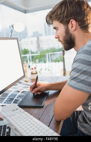 Grafik-Designer mit einem Grafiktablett Stockfoto