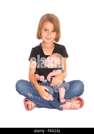 Junges Mädchen mit drei Wochen alten Baby. Stockfoto