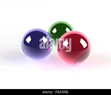 drei farbige Glaskugeln Stockfoto