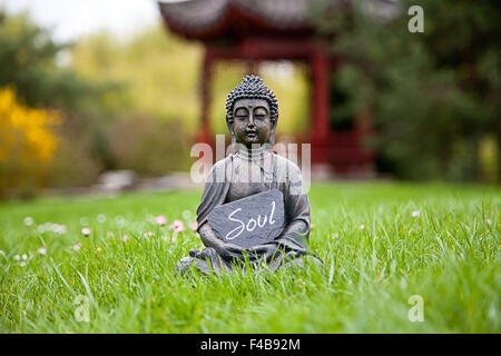 Das Wort Seele mit Buddha-Statue Stockfoto