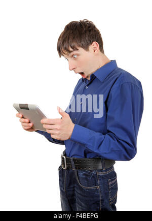 Junger Mann mit Tablet-PC Stockfoto