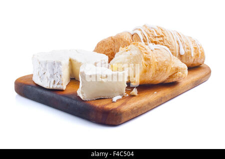 Corissant und Käse auf Holzbrett Stockfoto