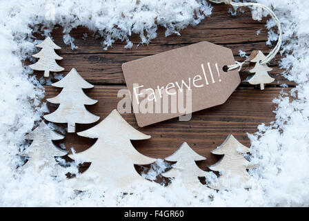 Beschriften Sie Weihnachtsbäume und Schnee Abschied Stockfoto