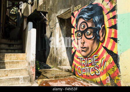 Ein graffity Portrait eines Jungen mit 3 Augen auf ein Haus im Vorort bandra Stockfoto
