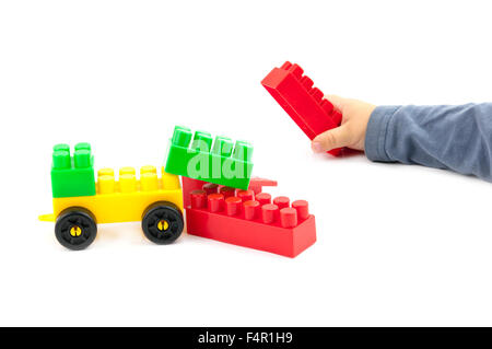 Stack-Hand up Lego set als Wand auf weißem Hintergrund Stockfoto