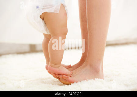 Mutter und Babys Fuß Stockfoto