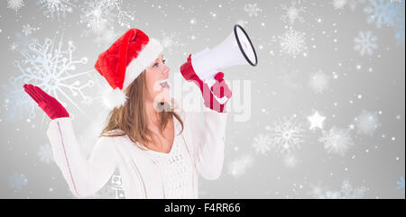 Zusammengesetztes Bild von festlichen blonde schreien über Megaphon Stockfoto