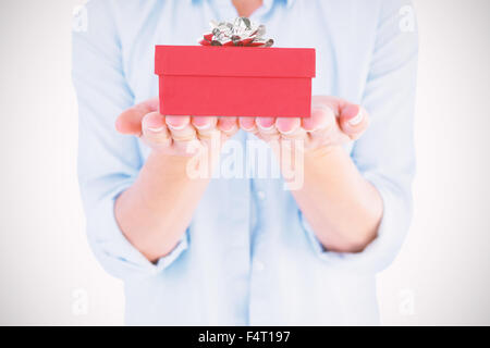 Zusammengesetztes Bild Womans Hände präsentieren Stockfoto