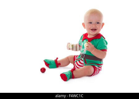 Kleinen Jungen gekleidet in Elf Kostüm, spielen auf dem Boden. Stockfoto