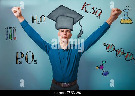 Chemie Lehrer Prozessor steht hob er seine Hände an die bl Stockfoto